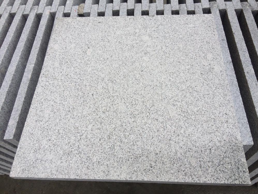 Grey granite paving slab