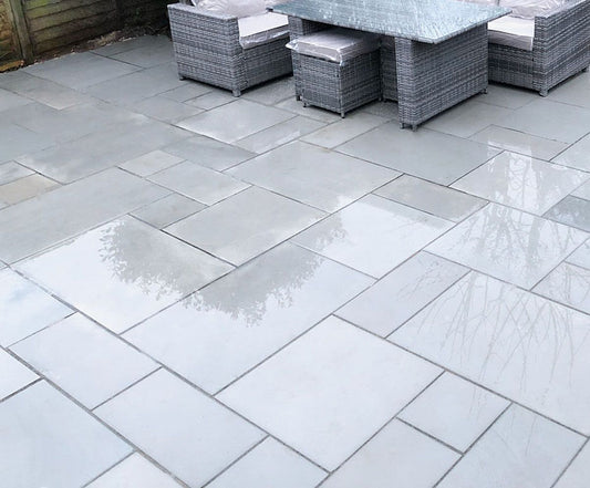 Kandla Grey Sawn And Honed Mixed Size Paving Slabs on patio