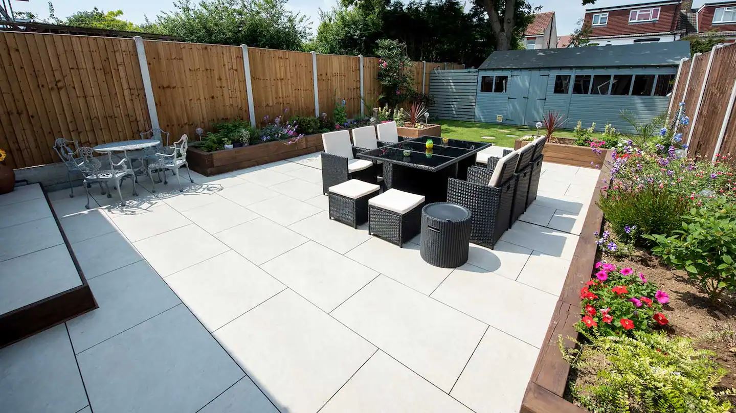 Porcelain paving slabs in garden with chairs and tables