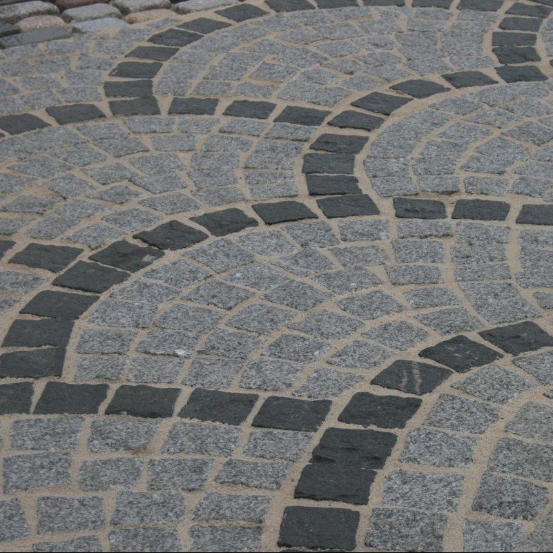 Galaxy Black granite cobbles in arch pattern