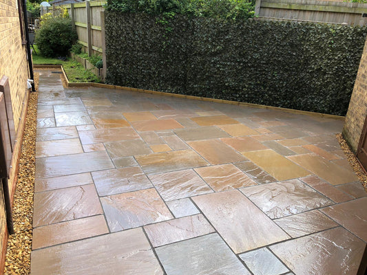 Autumn Brown sandstone paving slabs in Opus Romano laying pattern