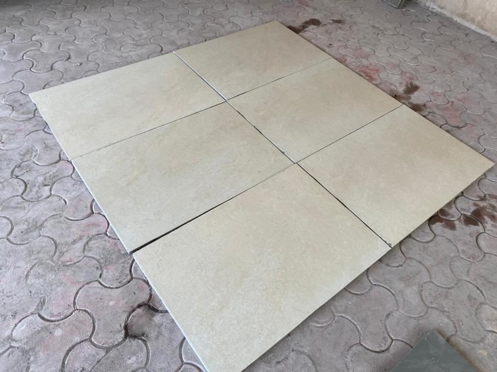 Hammerstone Beige porcelain paving slabs on floor