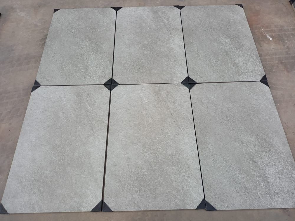 Hammerstone Grey porcelain paving slabs on floor