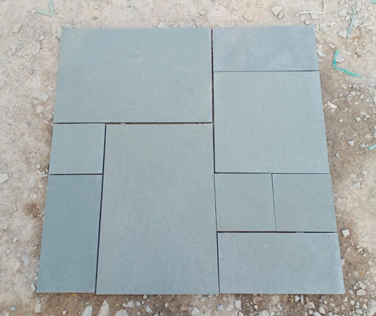 Kota Blue limestone paving slabs on ground dry