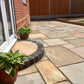 Rippon Buff sandstone paving slabs on patio