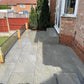 County Gris porcelain paving slabs on patio with steps