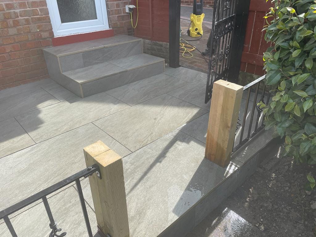 County Gris porcelain paving slabs on patio with steps