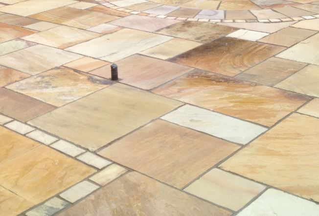 Fossil Mint sandstone paving slabs in Opus Romano laying pattern