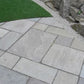 Kandla Grey sandstone paving slabs in mixed sizes by rocks