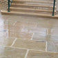 Raj Green sandstone paving slabs by steps wet